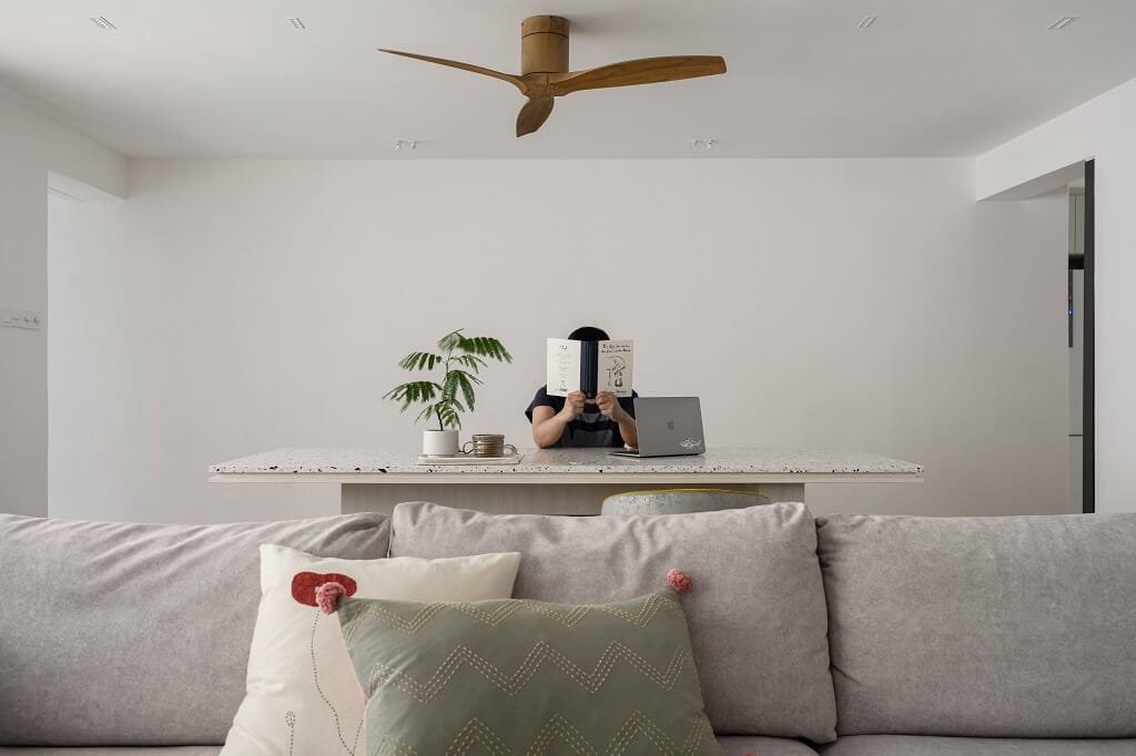 HDB renovation Singapore modern flat with sleek kitchen and cozy living space